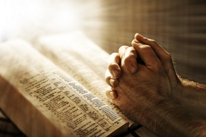 Bible-praying hands image